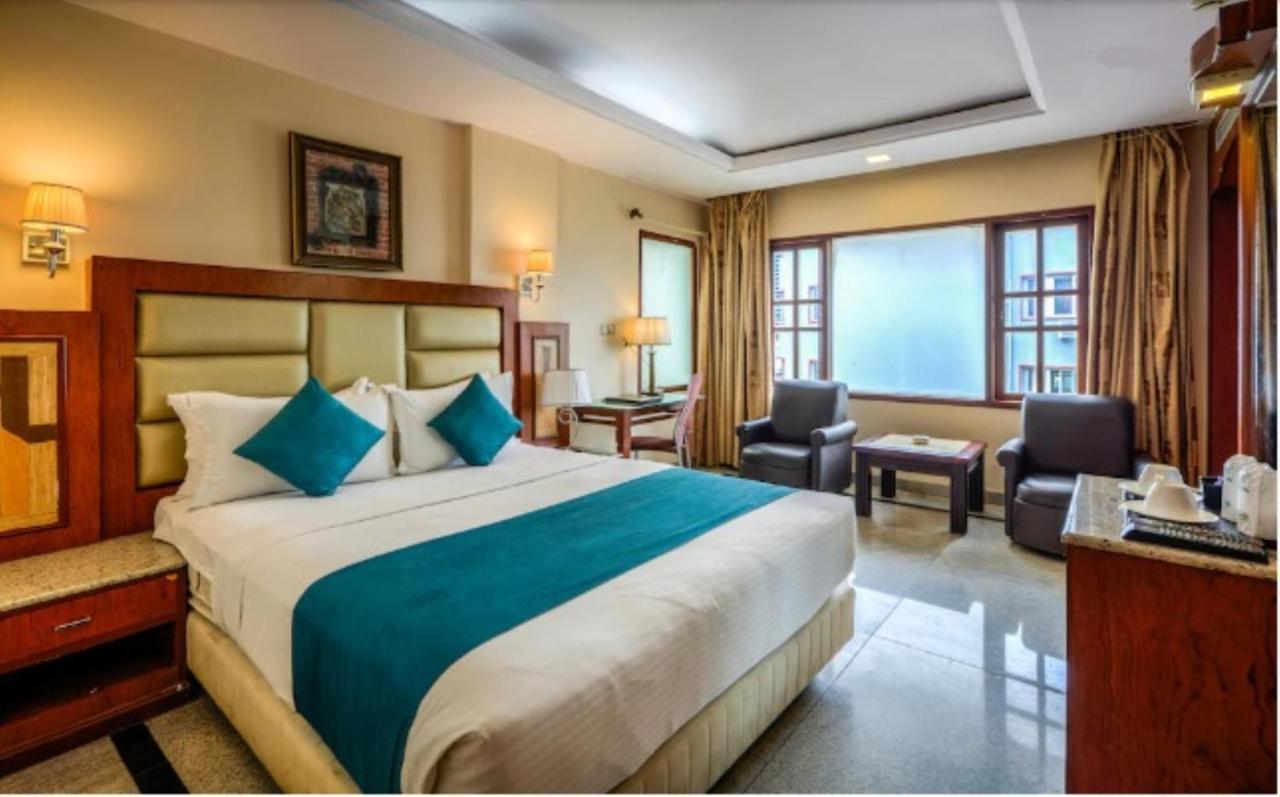 Golden Metro Hotel Bangalore Extérieur photo