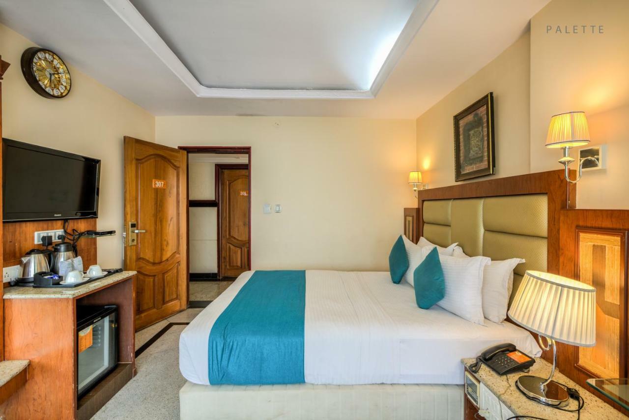 Golden Metro Hotel Bangalore Extérieur photo
